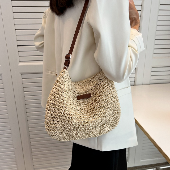 Stilig vevd håndveske for kvinner, brun/beige, med justerbar skulderrem; et elegant accessoir.