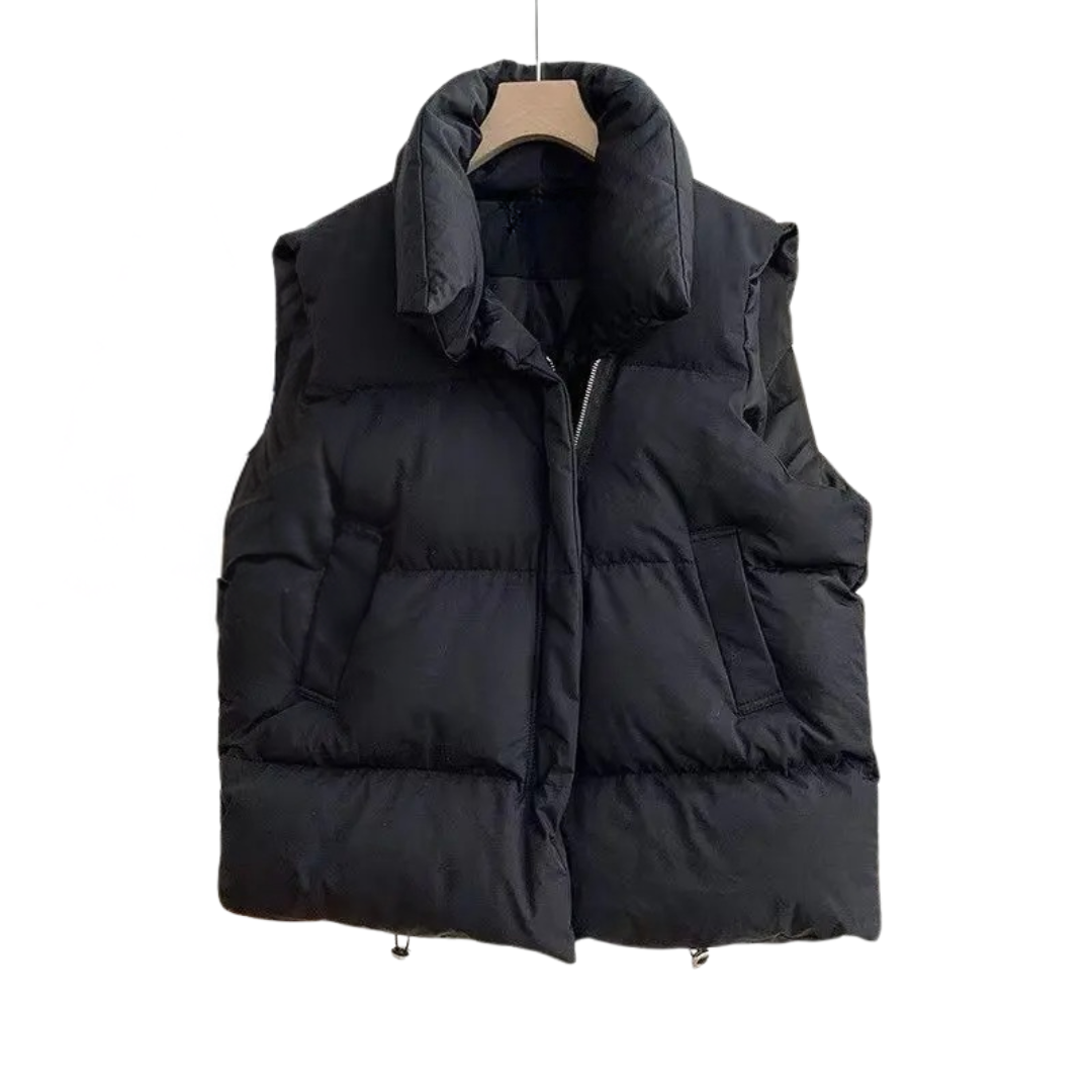 Varm vintervest for kvinner i stilrent design. Perfekt yttertøy for kalde dager, komfortabel og trendy.