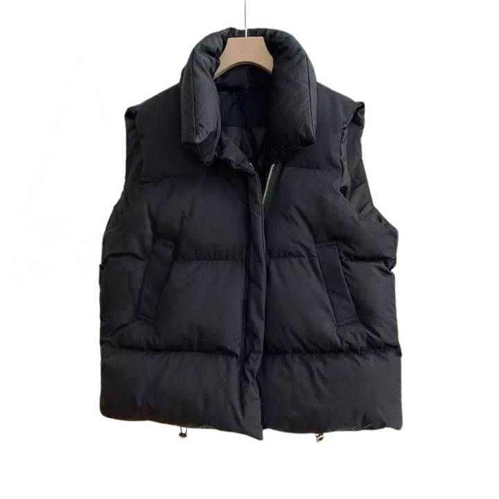 Varm vintervest for kvinner i stilrent design. Perfekt yttertøy for kalde dager, komfortabel og trendy.