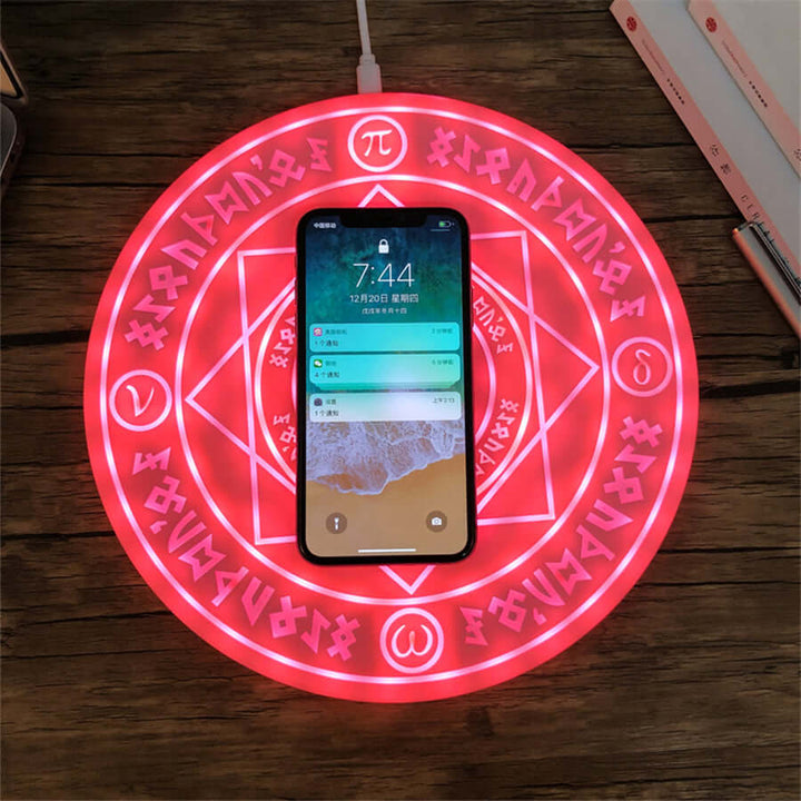 Stilig Qi-lader for telefoner med unikt RGB-lysdesign; et moderne smarttelefon tilbehør.