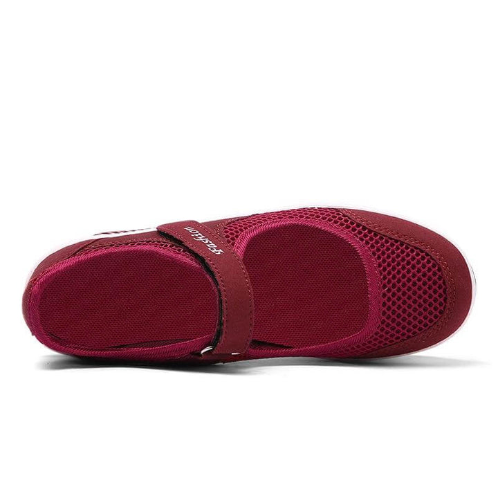 Kvinner sneakers med god demping, sklisikker såle for sikkerhet.