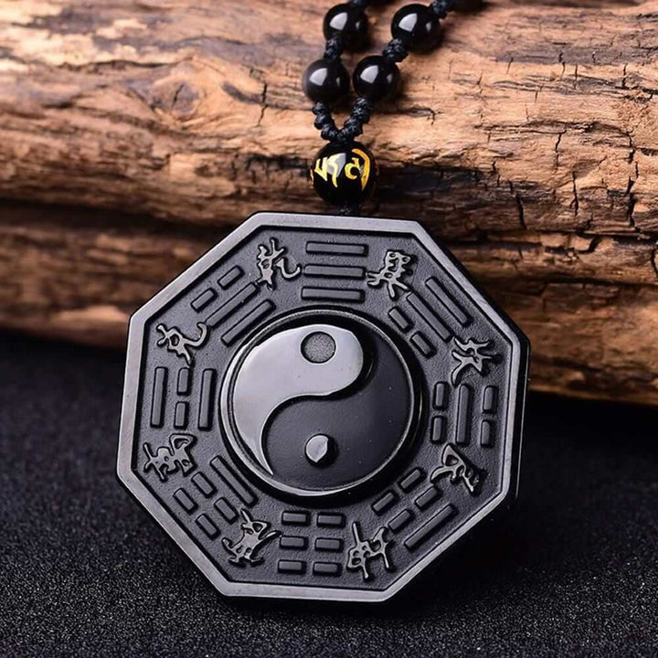 Unisex halskjede med obsidian yin yang. Perfekt for daglig bruk, gir beskyttelse og balanse.